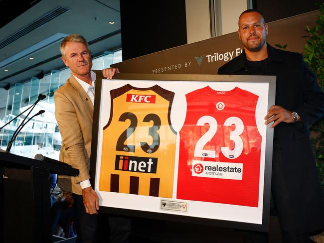 MELBOURNE, AUSTRALIA – APRIL 28: Lance Franklin is presented with a gift by Hawks President Andrew Gowers during the 2024 AFL Round 07 match between the Hawthorn Hawks and the Sydney Swans at the Melbourne Cricket Ground on April 28, 2024 in Melbourne, Australia. (Photo by Michael Willson/AFL Photos via Getty Images)