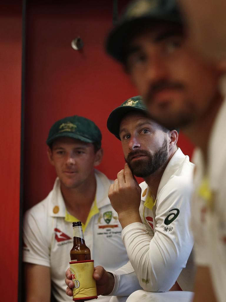 MANCHESTER, ENGLAND - SEPTEMBER 08: Matthew Wade and Josh Hazlewood of Australia celebrate in the change rooms after Australia claimed victory to retain the Ashes during day five of the 4th Specsavers Test between England and Australia at Old Trafford on September 08, 2019 in Manchester, England. (Photo by Ryan Pierse/Getty Images)