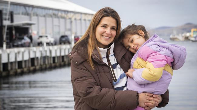 Patricia Dyer and four-year-old daughter Ella have arrived to a freezing Hobart from Sydney. Picture: Chris Kidd