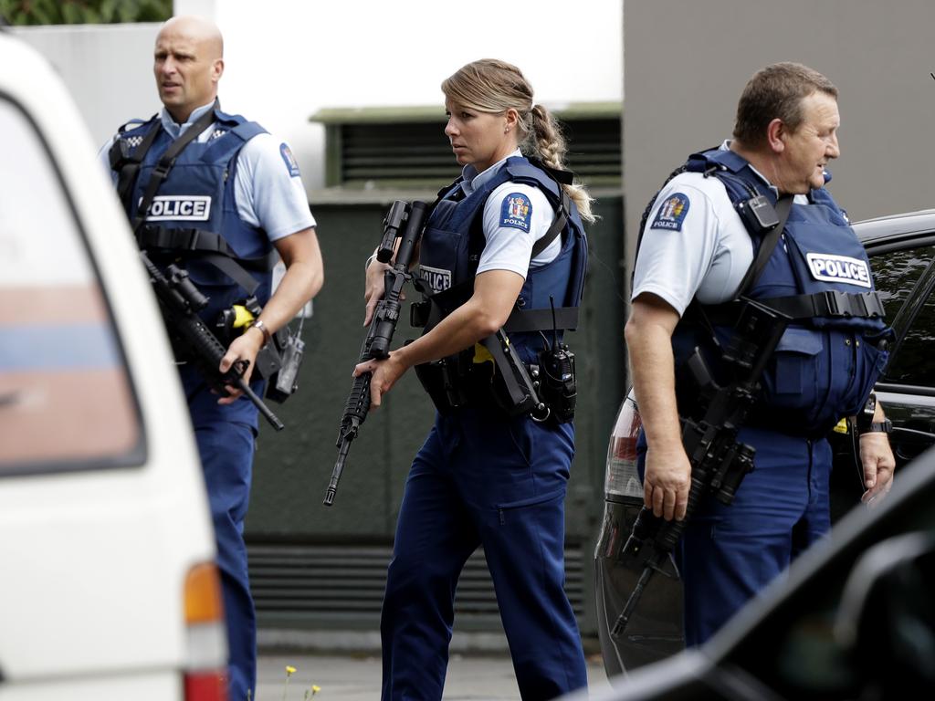 Armed police patrol outside a mosque in Christchurch. Picture: Mark Baker