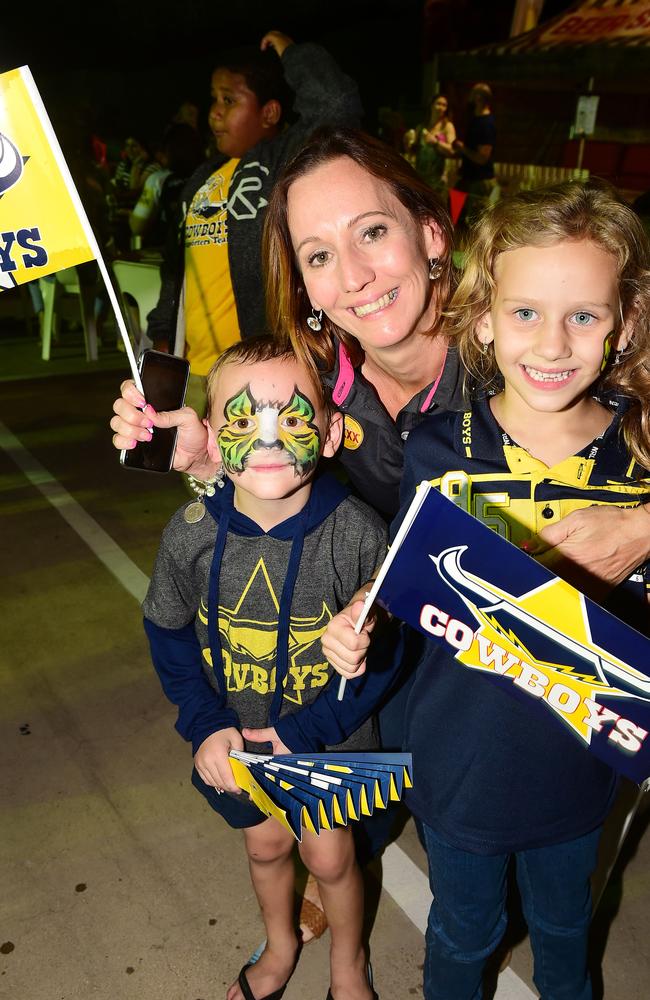 Cowboys fans packed the carpark behind the Cowboys Leagues club last night to watch their team smash the Sydney Roosters to now go on and play the Grand Final against Melbourne Storm next weekend. Brontie Regazzoli with kids Heath 5yo and Paige 6yo of Mt Low.