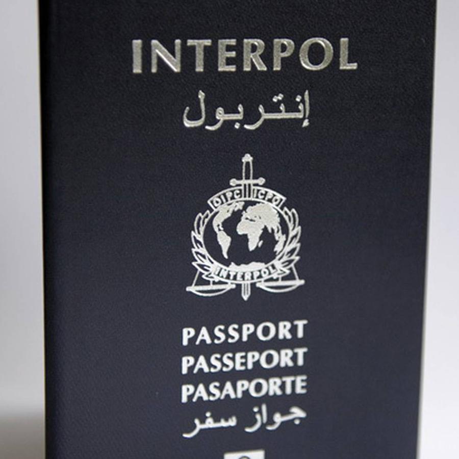 Interpol's international crime-fighting forces are issued with jet-black passports.