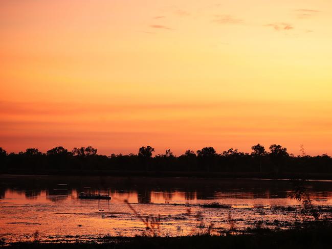 The morning light dances across the lake in Jabiru as all sorts of critters come to life.