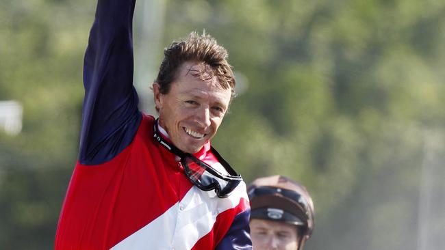 Michael Cahill after winning the 2013 Gold Coast Magic Millions 2YO Classic on Real Surreal.