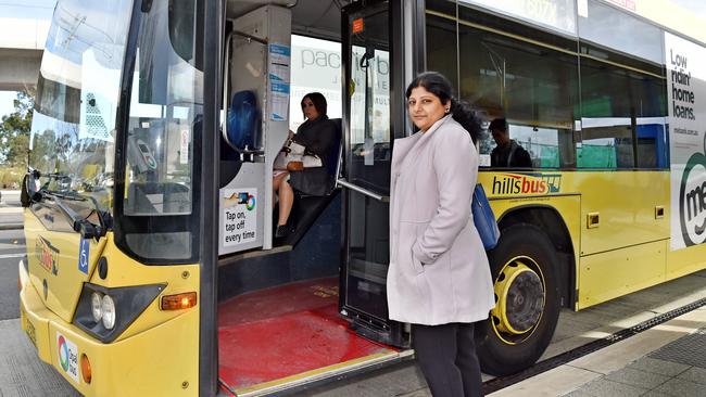 Bus commuter Dineesha Dronavalli waits for her bus at the Burns T-Way at Kellyville. Pic: AAP Image/Troy Snook