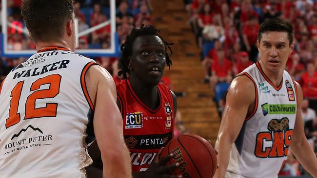 PERTH, AUSTRALIA — DECEMBER 09: Wani Swaka Lo Buluk of the Wildcats drives to the basket during the round eight NBL match between the Perth Wildcats and the Cairns Taipans at RAC Arena on December 09, 2018 in Perth, Australia. (Photo by Paul Kane/Getty Images)