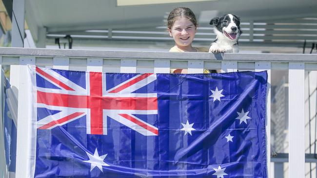 Miklaya Waldren and Maverick enjoy Australia Day 2025 on the Gold Coast. Australians are proud of their country, writes the author, and want to celebrate its achievements. Picture: Glenn Campbell