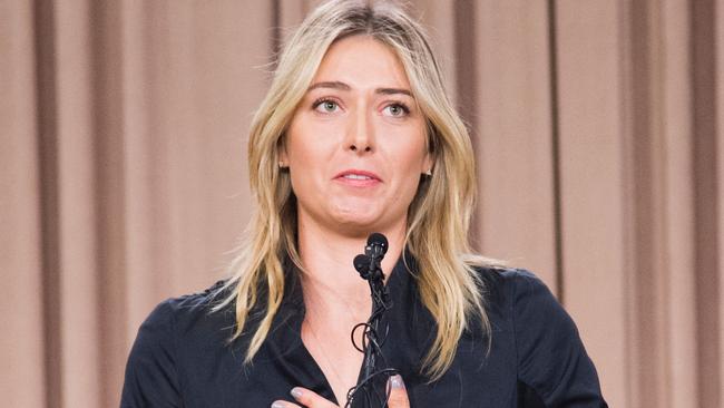 (FILES) This file photo taken on March 07, 2016 shows Russian tennis player Maria Sharapova speaking at a press conference in downtown Los Angeles, California, March 7, 2016. Russian tennis star Maria Sharapova hailed the reduction of her two-year doping ban on October 4, 2016 as 'one of my happiest days'. The Court of Arbitration for Sport (CAS) cut her ban imposed by an independent tribunal appointed by the International Tennis Federation for testing positive for meldonium to 15 months. / AFP PHOTO / ROBYN BECK