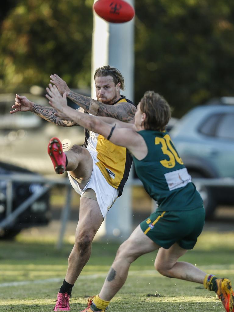 Southern: Josh Cardamone gets a kick away for Ashwood against Endeavour Hills. Picture: Valeriu Campan