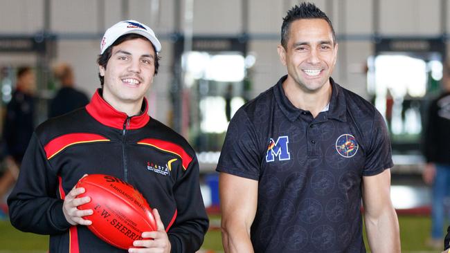 Ramblers midfielder Keynan Harradine (left), pictured with Crows legend Andrew McLeod. Picture: Newscorp