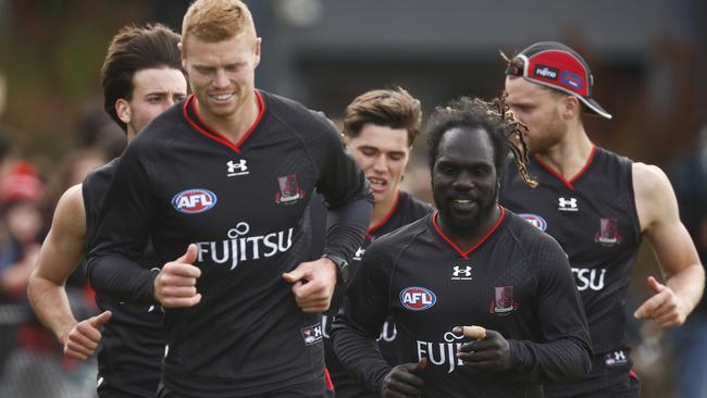 MELBOURNE, AUSTRALIA - DECEMBER 14: Anthony McDonald-Tipungwuti of the Bombers (R) and Peter Wright of the Bombers in action during an Essendon Bombers AFL training session at The Hangar on December 14, 2022 in Melbourne, Australia. (Photo by Daniel Pockett/AFL Photos/via Getty Images)