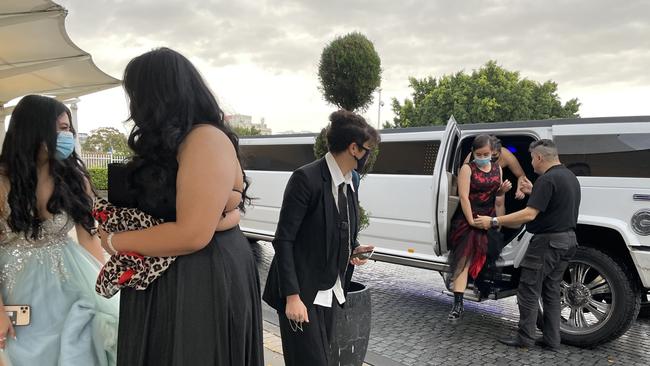 Students arrive in luxury with a limo.