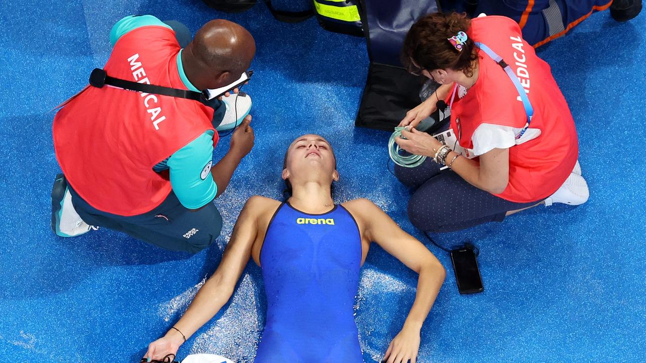 Tamara Potocka collapsed poolside after her 200m IM heat. (Photo by Al Bello/Getty Images)