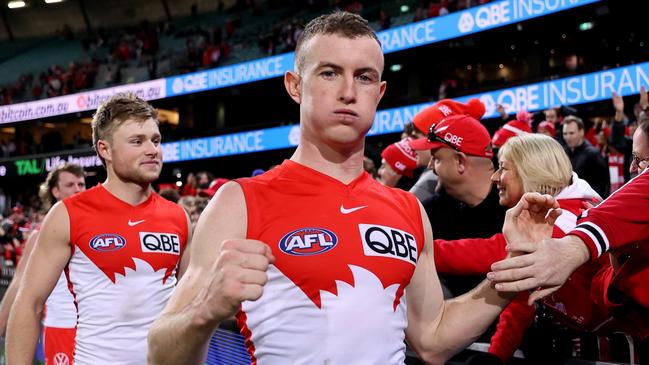 SYDNEY, AUSTRALIA - AUGUST 09: Chad Warner of the Swans celebrates with fans at full-time during the round 22 AFL match between Sydney Swans and Collingwood Magpies at SCG, on August 09, 2024, in Sydney, Australia. (Photo by Brendon Thorne/AFL Photos/via Getty Images)