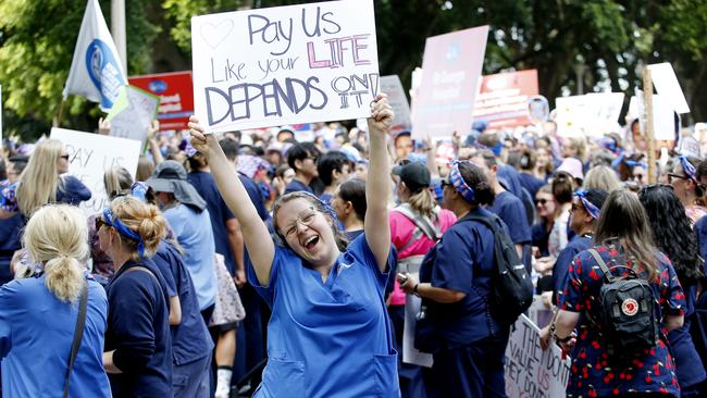 SYDNEY, AUSTRALIA - NewsWire Photos SEPTEMBER 24 , 2024:   Nurse Caitlyn Moore   gathers with nurses in Hyde Park as Nurses and Midwives march to State parliament as part of their 24 hour strike to demand better pay and for the the NSW government to better value their professions.Picture: NewsWire / John Appleyard