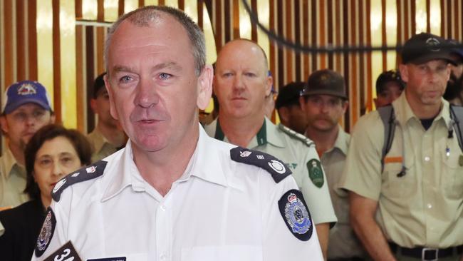 Deputy Emergency Management Commissioner, Chris Stephenson speaks as US firefighters arrive at Melbourne International Airport. Picture: AAP