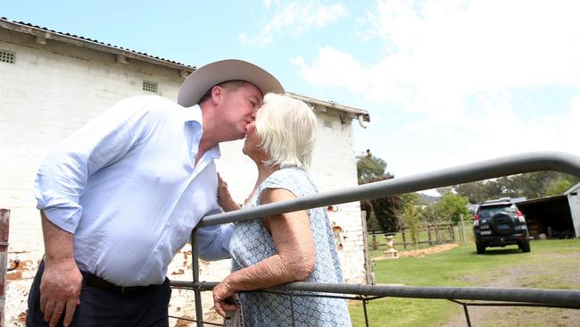 Pressing the flesh ... Barnaby Joyce meets ardent supporter Jill Skewes over the fence at her Bendemeer home. Picture: Peter Lorimer