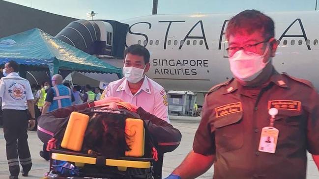 Pictured is the team who work with Chief of EMS Ruamkatanyu operation, Piyalak Kinkaew,  who was first on scene on the tarmac after the Singapore Airlines aircraft touched down in Bangkok. He treated Aussies, and had drilled for such a scenario. Picture: Jang Sawitree,