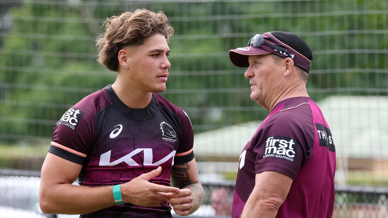 Reece Walsh talking with coach Kevin Walters. Picture: Liam Kidston.