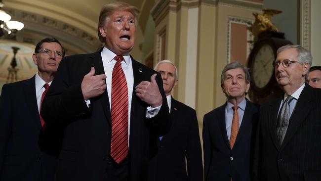 Donald Trump speaks to members of the media before meeting with congressional leaders. Picture: AFP. 