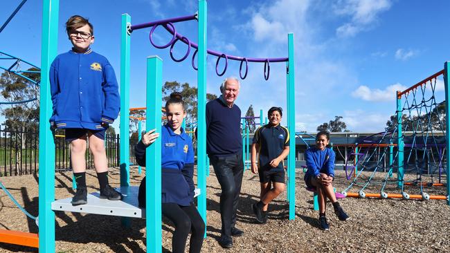 Cranbourne West Primary School students, from left, Travis, Alinta, Jayvan and D'jonay, with principal Andrew Bergmeier, await their NAPLAN results. Picture: Aaron Francis