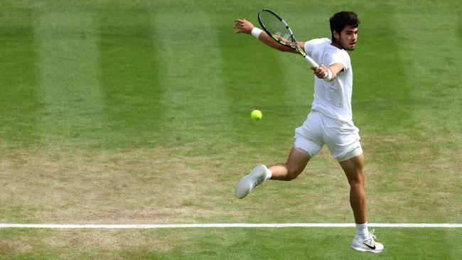 Carlos Alcaraz plays a backhand in the final against Novak Djokovic. Picture: Getty Images.