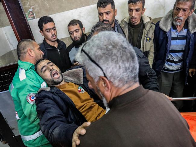 Palestinians injured in Israeli air strikes arrive at Nasser Medical Hospital in Khan Younis, Gaza. Picture: Getty Images