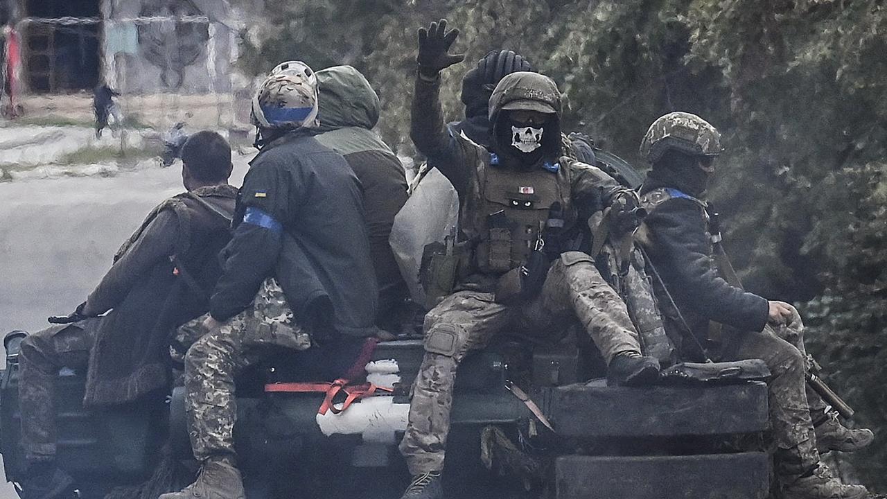 Ukrainian soldiers sit atop a tank in Izyum in eastern Ukraine on September 14. Picture: Juan Barreto/AFP