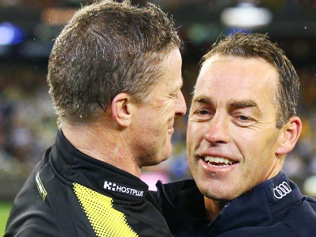 MELBOURNE, VICTORIA - SEPTEMBER 06:  Tigers head coach Damien Hardwick (L) and Hawks head coach Alastair Clarkson embrace during the AFL First Qualifying Final match between the Richmond Tigers and the Hawthorn Hawks at Melbourne Cricket Ground on September 6, 2018 in Melbourne, Australia.  (Photo by Michael Dodge/AFL Media/Getty Images)