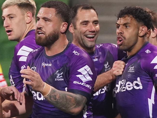 Josh Addo-Carr of the Storm reacts with Cameron Smith of the Melbourne Storm and Cameron Munster of the Storm after scoring a try during the Round 4 NRL match between Melbourne Storm and the South Sydney Rabbitohs at AAMI Park in Melbourne, Friday, June 5, 2020. (AAP Image/Scott Barbour) NO ARCHIVING, EDITORIAL USE ONLY