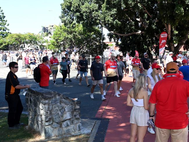 BRISBANE, AUSTRALIA - MARCH 05: Dolphins fans enter the stadium before the round one NRL match between the Dolphins and Sydney Roosters at Suncorp Stadium on March 05, 2023 in Brisbane, Australia. (Photo by Bradley Kanaris/Getty Images)