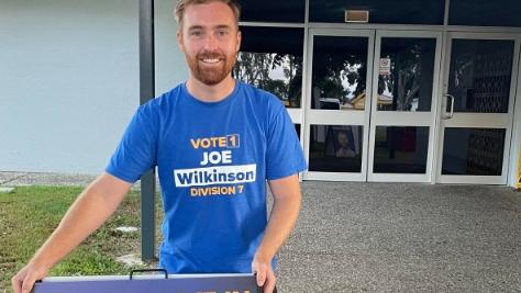 Division Seven candidate Joe Wilkinson starting to prepare for pre-poll at 5.30am at the Runaway Bay booth in the Gold Coast City Council 2024 election.