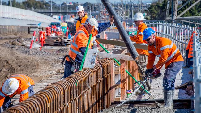 Workers at the West Gate Tunnel site. Picture: Jake Nowakowski