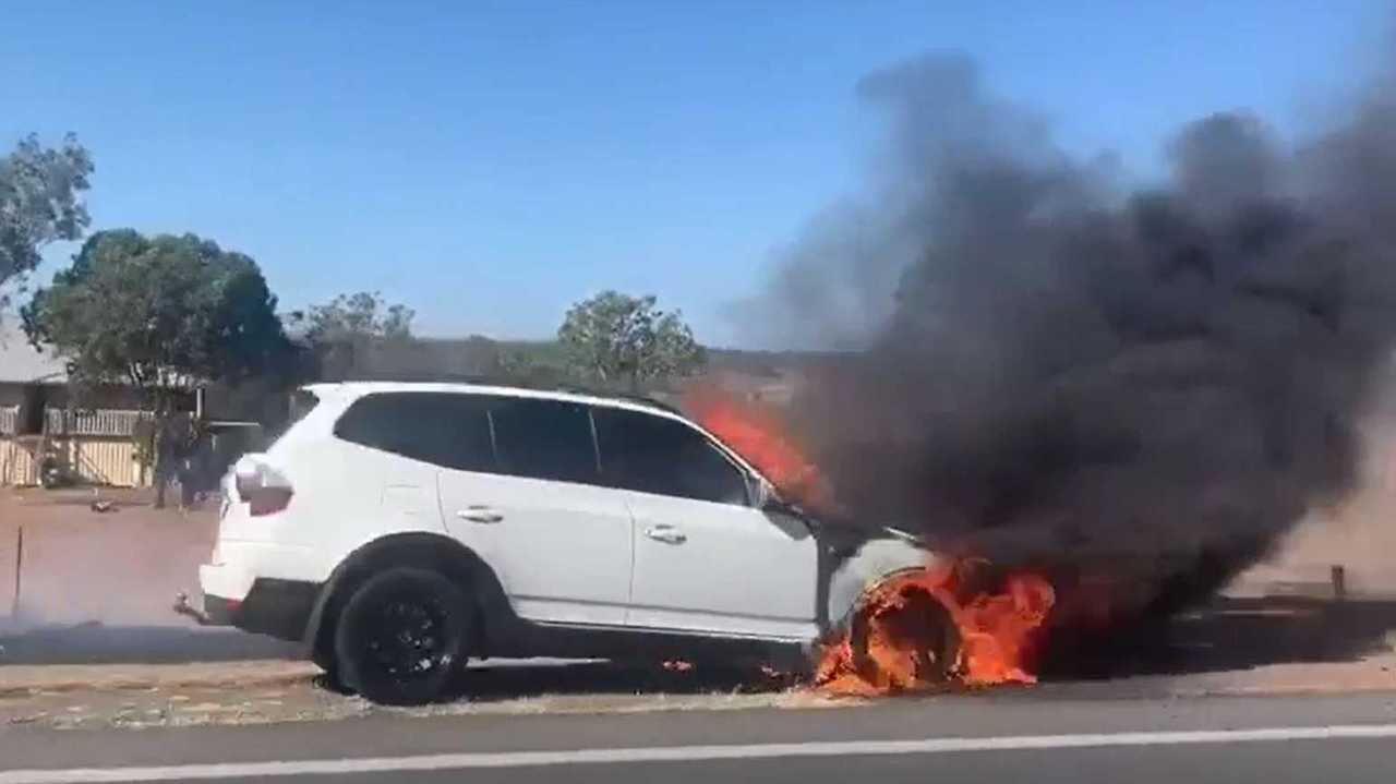 A car on fire on the side of the Warrego Highway. Picture: Contributed