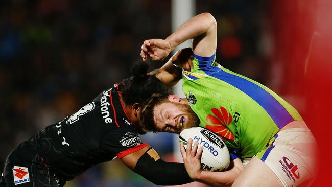 It was a rough and tumble game across the ditch. Photo by Anthony Au-Yeung/Getty Images.