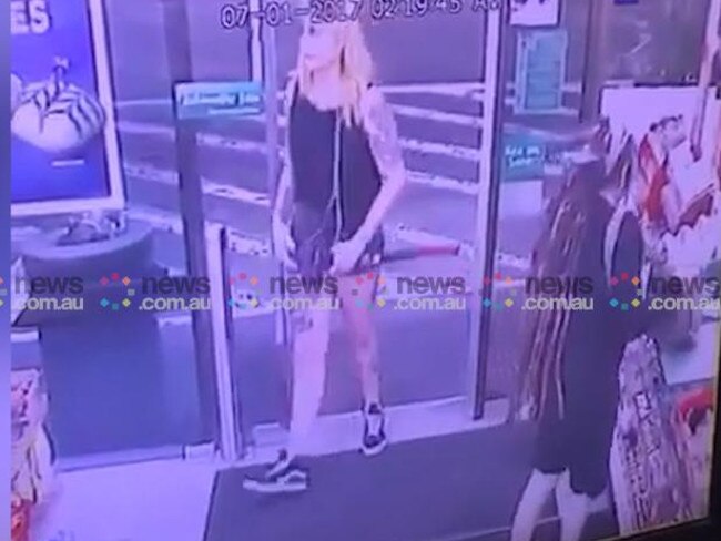 CCTV footage from the 7-Eleven shows Amati walking into the service station with an axe.