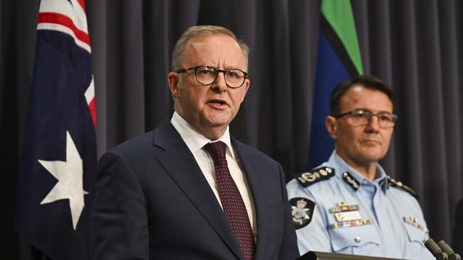 Anthony Albanese, front, and Australian Federal Police Commissioner Reece Kershaw on Monday. Picture: Martin Ollman