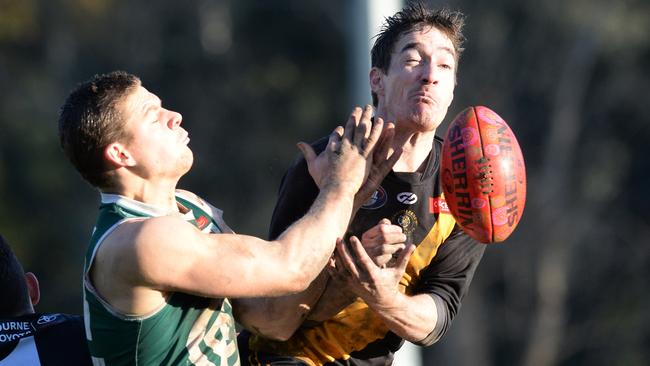 Tynan Smith and Tom Sullivan clash. Picture: Chris Eastman