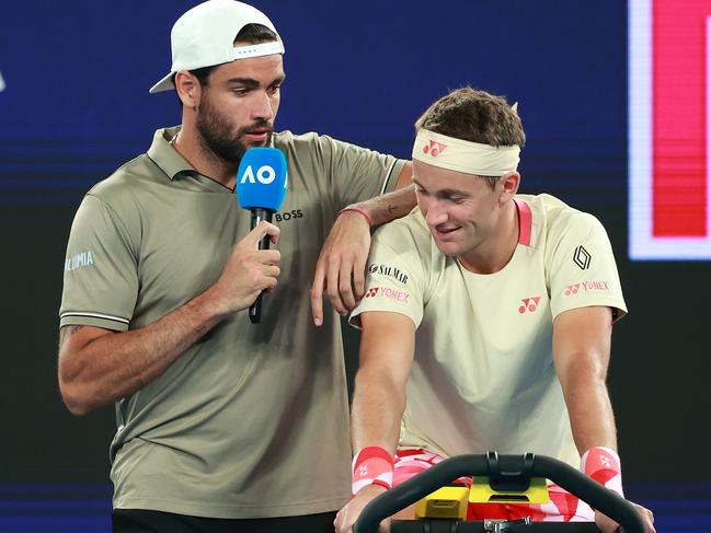 Matteo Berrettini of Italy interviews Casper Ruud of Norway during the Red Bull Bassline, after stealing Dylan Alcott’s mic. Picture: Kelly Defina/Getty Images