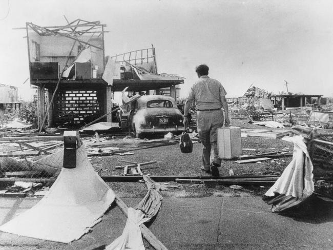 TAUS 60th Anniversary. Cyclone Tracy occurred on Christmas day, 1974 in Darwin. A devastated home-owner returns from holiday to find his home wrecked. Picture Bruce Howard