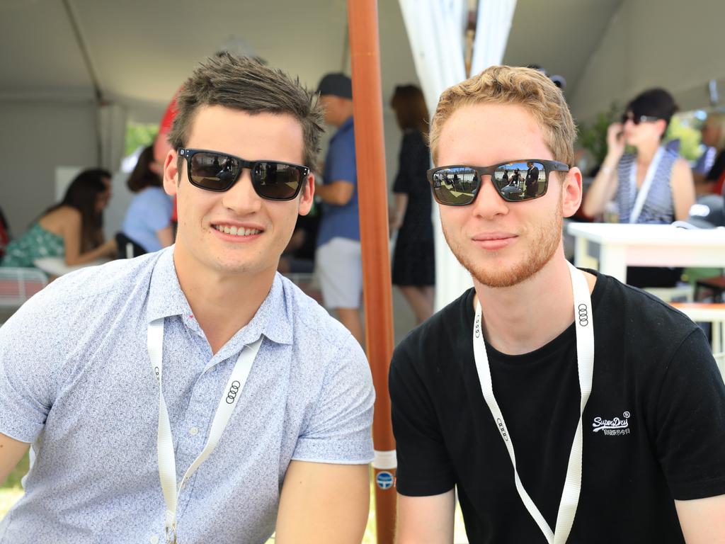 Riley Collins and Brad Bice were among the VIP Audi Solitaire customers who viewed the Adelaide Motorsport Festival track side. Picture: Kane Overall