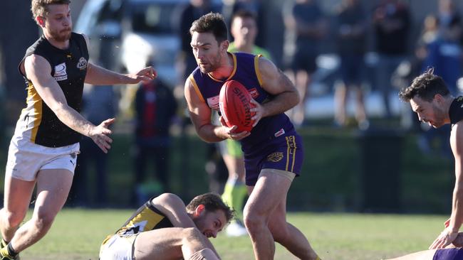 Vermont’s Adam Parker takes on Balwyn. Picture: David Crosling