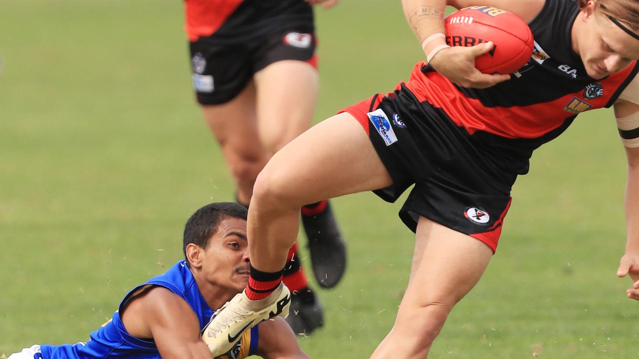 North Shore’s Joseph Salmon attempts to tackle Newtown &amp; Chilwell player Will O’Dwyer in their opening GFNL fixture at Elderslie Reserve. Picture: Mark Wilson