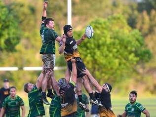 GRAND FINALISTS: University and Caloundra in action. Photo: John McCutcheon.