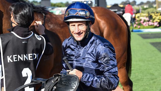 Damien Oliver returns to the mounting yard after Personal won the VRC Oaks at Flemington. Picture: Racing Photos via Getty Images