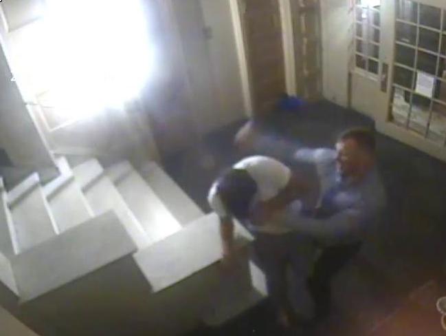 Foyer Area CCTV photo shows former NRL player Matthew Lodge assaulting Joseph Cartright after being let into an apartment building in New York City. Picture: Supplied