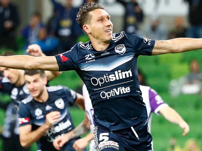 MELBOURNE, AUSTRALIA - JANUARY 13:  Mark Milligan of the Victory celebrates  after scoring his sides second goal during the round 16 A-League match between the Melbourne Victory and Perth Glory at AAMI Park on January 13, 2018 in Melbourne, Australia.  (Photo by Scott Barbour/Getty Images)