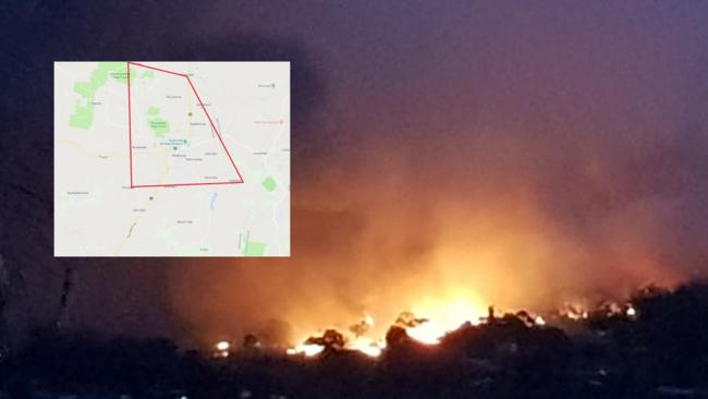 Kristine Kotzas captured vision of the bushfire burning at Stanthorpe from Mt Marlay. . Picture: Kristine Kotzas