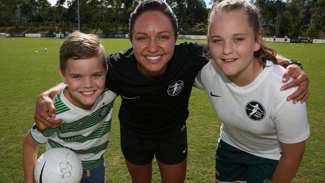 Kyah Simon with Thomas and Molly during her first football clinic in March at Valentine Sports Park, Glenwood. Picture: Carmela Roche