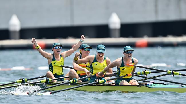 Australia rowers, from left, Ria Thompson, Rowena Meridith, Harriet Hudson and Caitlin Cronin celebrate after finishing 3rd place in the Women's Quadruple Sculls Final A at the Sea Forest Waterway during the 2020 Tokyo Summer Olympic Games in Tokyo, Japan on 28 July 2021 (Photo By Seb Daly/Sportsfile via Getty Images)